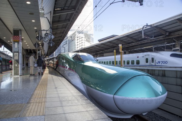 Tokyo, Japan, December 23, 2014: A Shinkansen train standing at a platform before departure, Asia