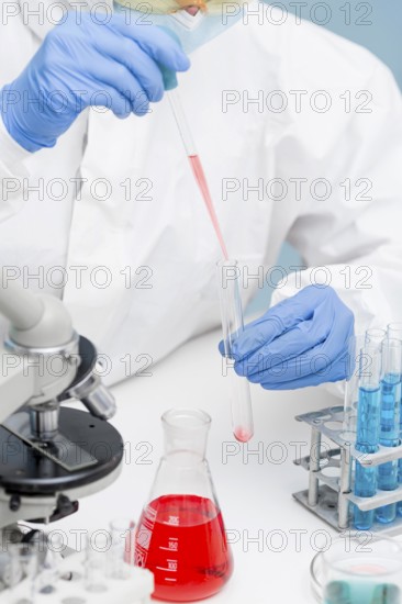 Scientist working with chemical substances lab