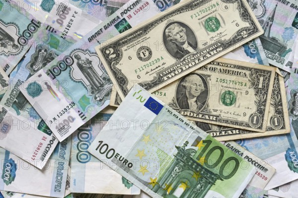 Background of paper bills dollars, euros and rubles