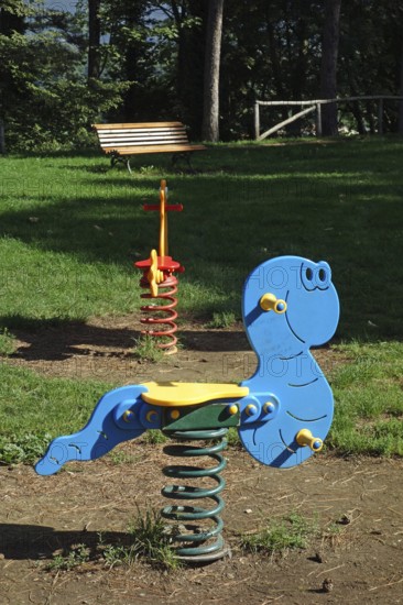 Feather teeter-totter on a playground in Arezzo Italy