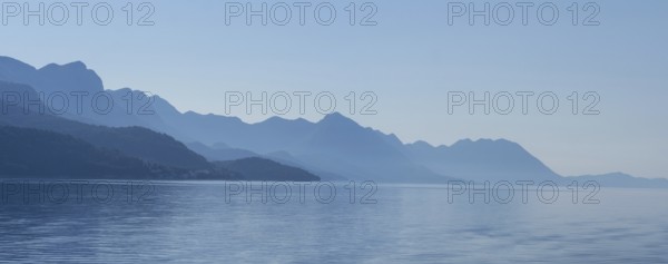 Mountain range by the sea in the morning light, panoramic shot, Makarska Riviera, near Makarska,