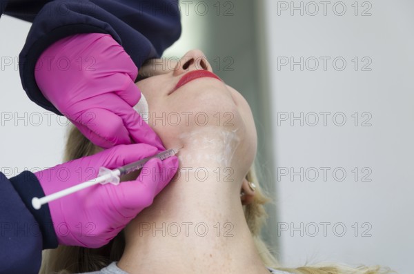 Great concept of aesthetic treatment of jowls, injection of deoxycholic acid