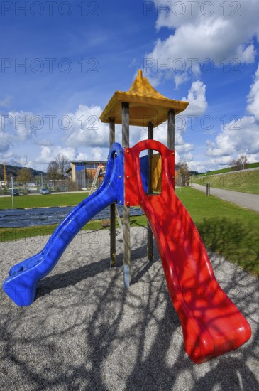 Children's slide at the pond in WiWaLaMoor, Wildpoldsried, Allgäu, Swabia, Bavaria, Germany, Europe