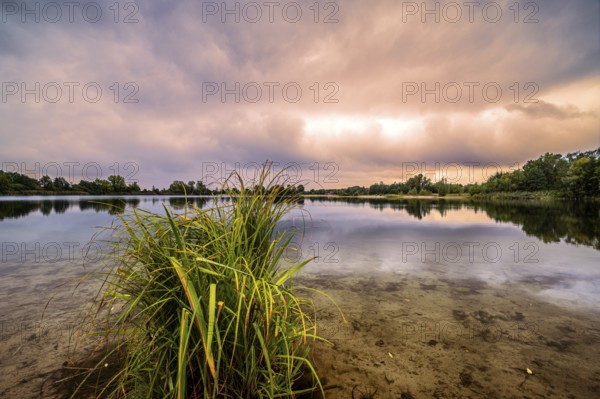 The Hufeisensee in Isernhagen near Hanover in autumn during rain and sunset, Isernhagen, Lower