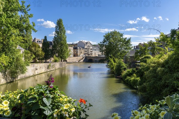Metz, France - 1 June, 2022: view of the Moselle River and the historic city center of Metz