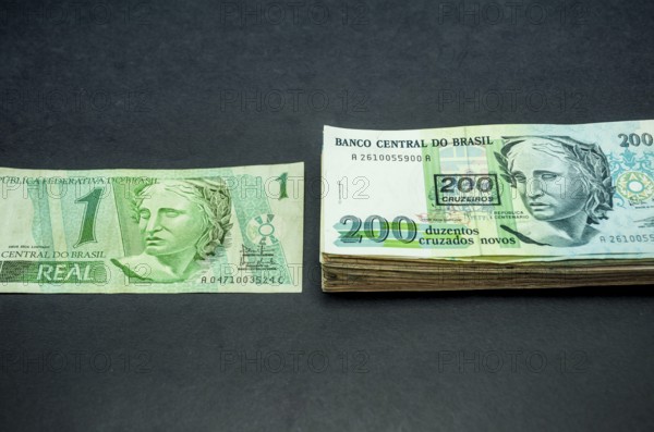Stack of money, concept of inflation, currency conversion. Brazilian currency, Real for Cruizeiros