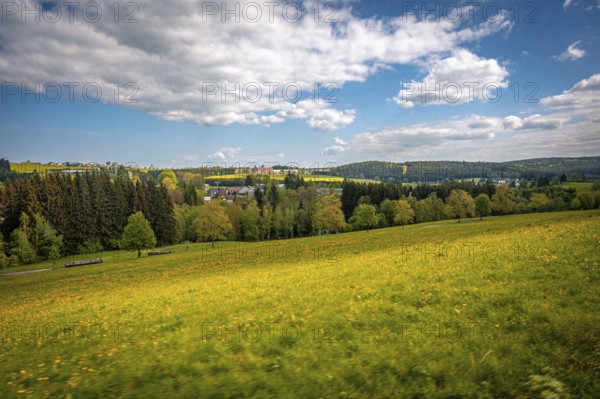 View over forest and meadow in Vogtland, Schönheide, Saxony, Germany, Europe