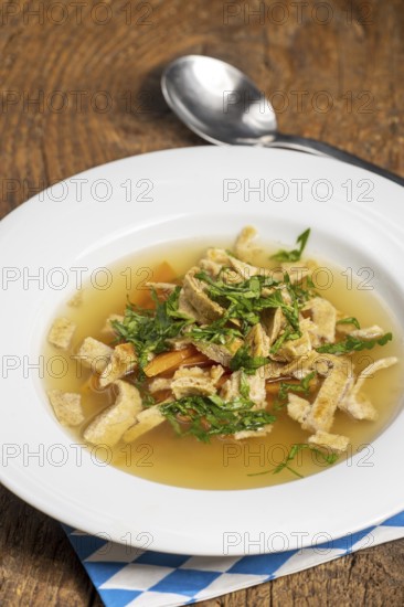 Austrian pancake soup on wood