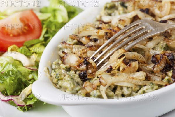 Spinach spaetzle with fork