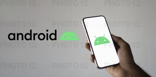 Android logo on smartphone, Android is a mobile operating system based on the Linux kernel