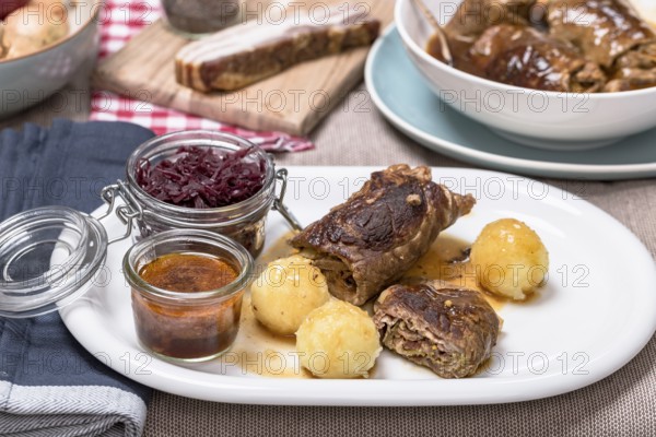 Home-style beef roulade with red cabbage and potato dumplings