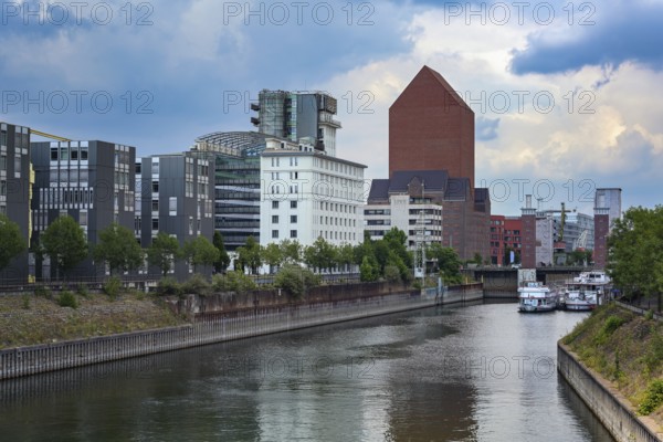 Inner harbor of Duisburg, Germany with the State archive of North Rhine-Westphalia, the monumental