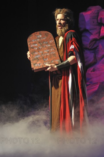 Moses with the Ten Commandments in a Biblical stage performance