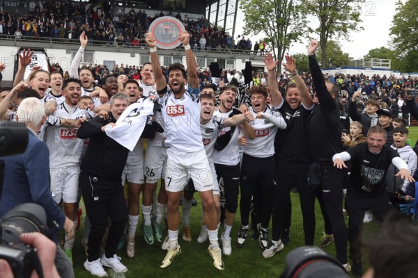 Champion's jubilation and championship trophy, Tevfik Ceylan (FC 08 Villingen) can't stop