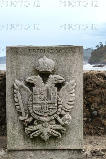 Memorial stone with the coat of arms of Emperor Charles V, commemorating his landing in Tazones on