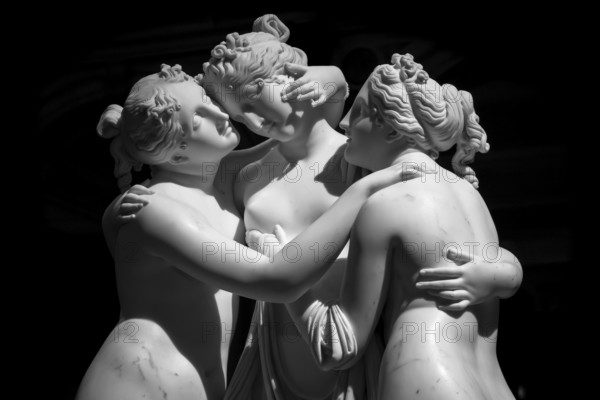 Milan, Italy - June 2020: Antonio Canova?s statue The Three Graces (Le tre Grazie). Neoclassical