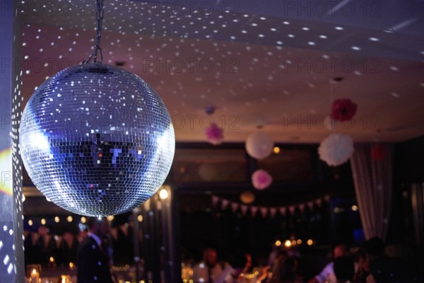 Nightclub disco ball with colorful reflections