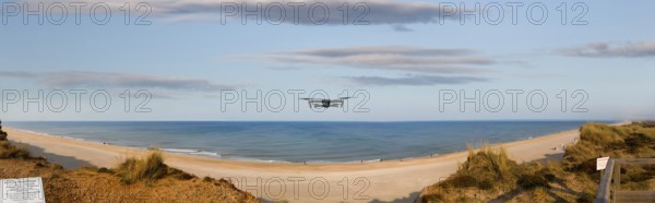 Drone in flight mode on a cliff, Sylt, Schleswig-Holstein, Germany, Europe
