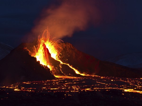 Stunning view of volcanic eruption in Geldingadalir valley near Fagradalsfjall mountain, Grindavík,