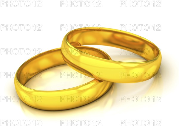 Golden wedding rings on a white beckground