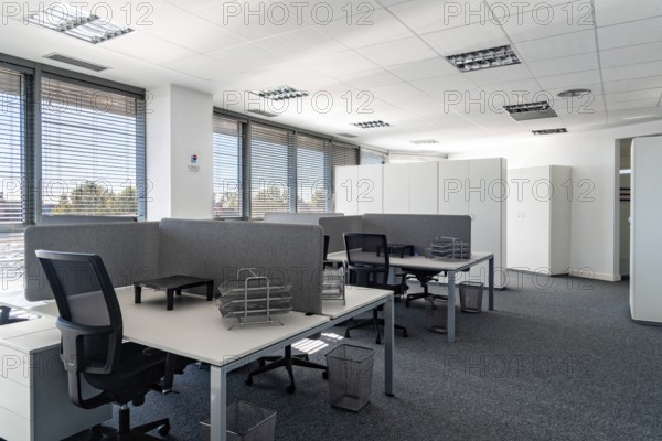 Empty places for workers in contemporary coworking. Startup business office interior at new