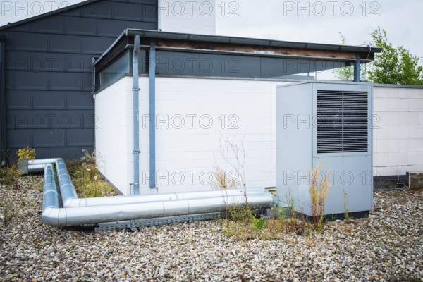 A heat pump on the roof of a house in Düsseldorf, Germany, Europe