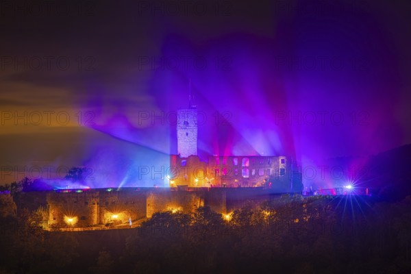 The castle in the town of Königstein im Taunus is brightly illuminated in the evening. From 18