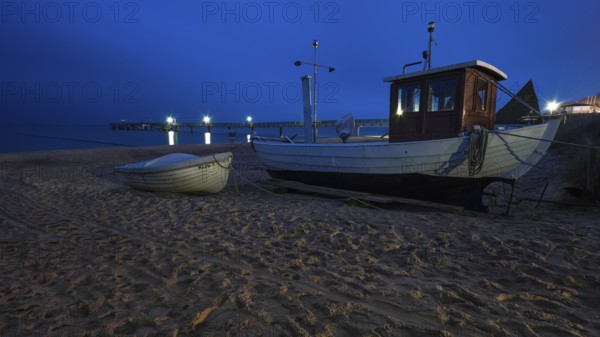 Fishing boats on the beach of Koserow with a long exposure taken in the evening