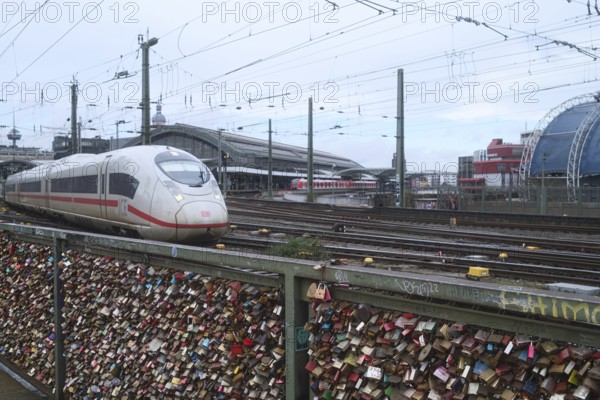 View of Cologne Central Station with ICE, love locks in front, Cologne, Germany, Europe