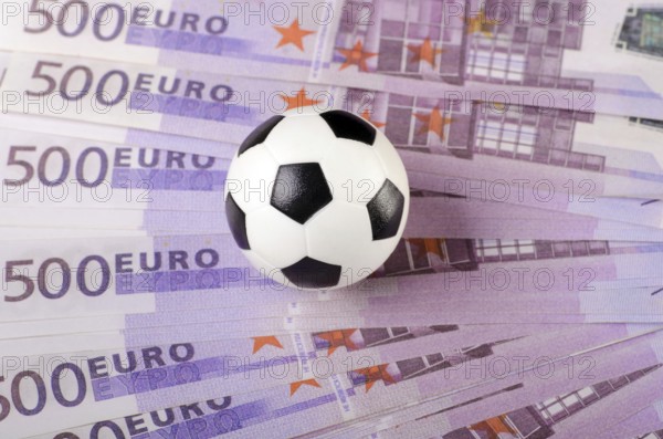 Soccer ball on background of euro banknotes