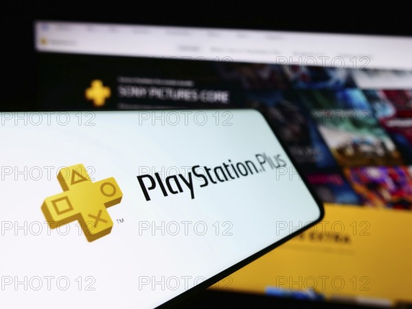 Stuttgart, Germany, 02-14-2024: Cellphone with logo of subscription service PlayStation Plus (PS