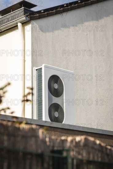 A heat pump on the roof of a garage in Langenfeld, Germany, Europe