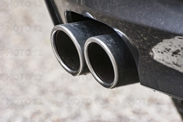 Closeup of an exhaust pipe of a car