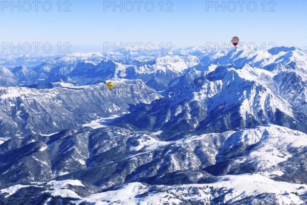Hot air balloons flying over the Alps, Unterinntal, Tyrol, Austria, Europe