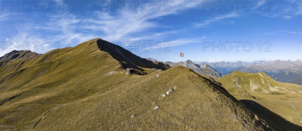 Chörbschhorn and Chörbschhornhütte with Swiss flag, aerial view, Davos, Grisons, Switzerland,