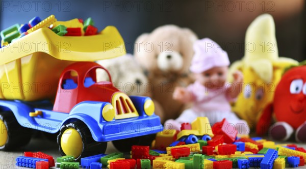 Colorful plastic and plush toys in a children's room
