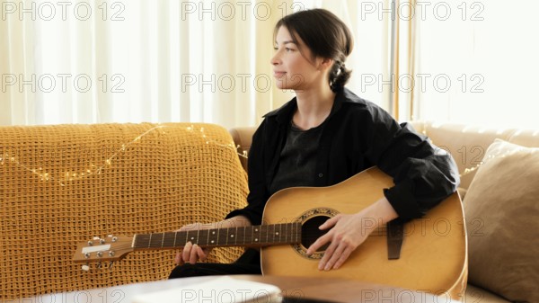 Creative musician practicing indoors 4