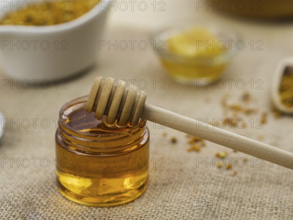Wooden dipper sticky honey. Resolution and high quality beautiful photo