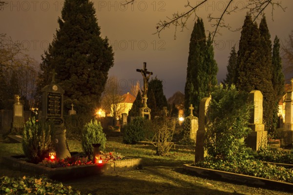SCHROBENHAUSEN, GERMANY - DECEMBER 24: Night at an old historic graveyard in Schrobenhausen,