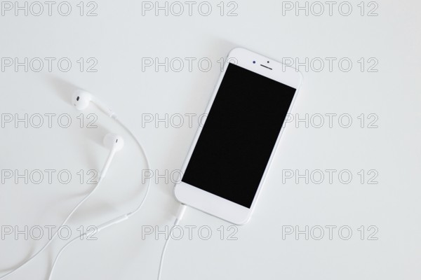 Smartphone with earphone isolated white background. Resolution and high quality beautiful photo