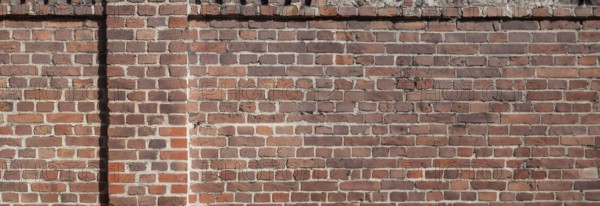 Uniform brick wall with no recognisable features, Bottrop, North Rhine-Westphalia, Germany, Europe