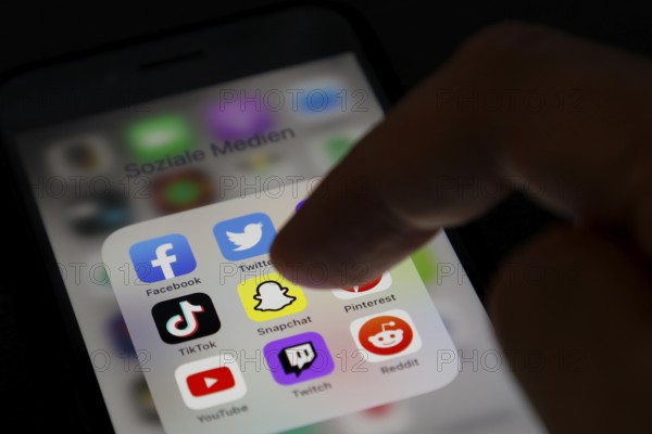 Social media icon, detailed view of a smartphone with social media apps, Facebook, Twitter,