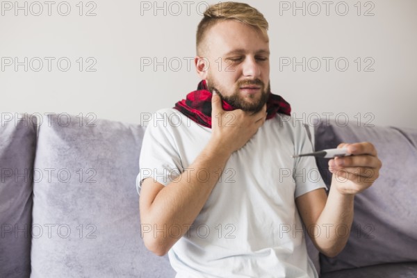 Man scarf holding hand neck