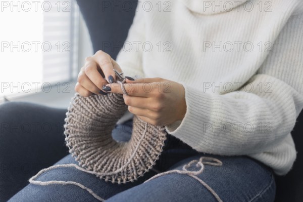 Woman home knitting close up 11