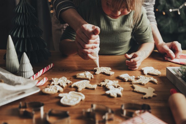 Christmas and New Year food preparation. Xmas gingerbread cooking, making and decorating freshly