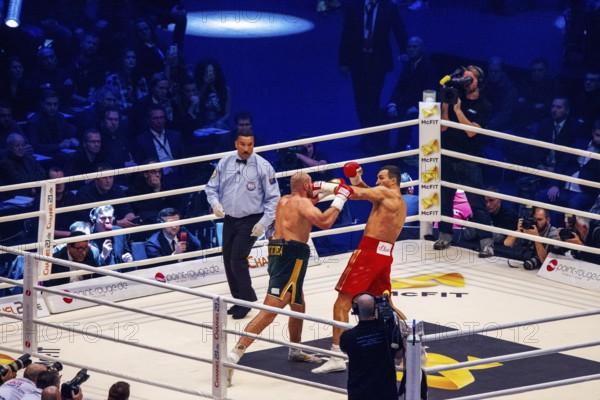 28-11-2015 Dusseldorf Germany. Tyson Fury and Wladimir Klitschko in centre of boxing ring, attack