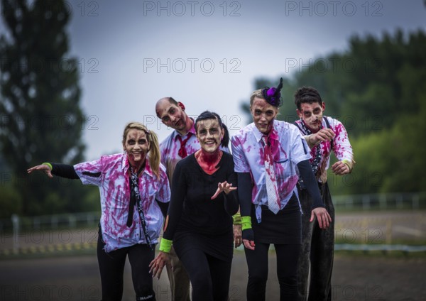 BERLIN, GERMANY, MAY 18: Participants of the Zombie Run in Karlshorst on May 18, 2014 in Berlin,