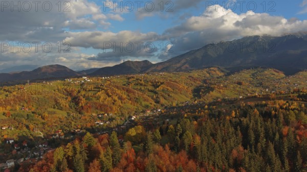 Autumn in Transylvania. Rural aerial landscape at sunset in the Carpathians mountains, Romania,