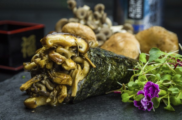 Sushi. Traditional Japanese cuisine, Temaki premium mushrooms, shitake, shimeji, decorated in an
