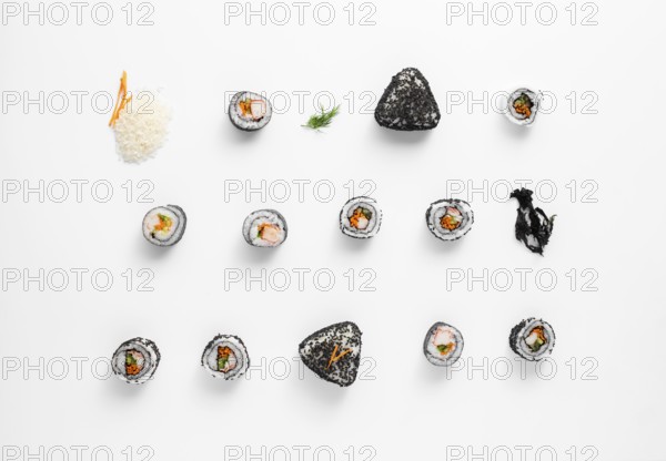 Asortment maki sushi rolls n white background